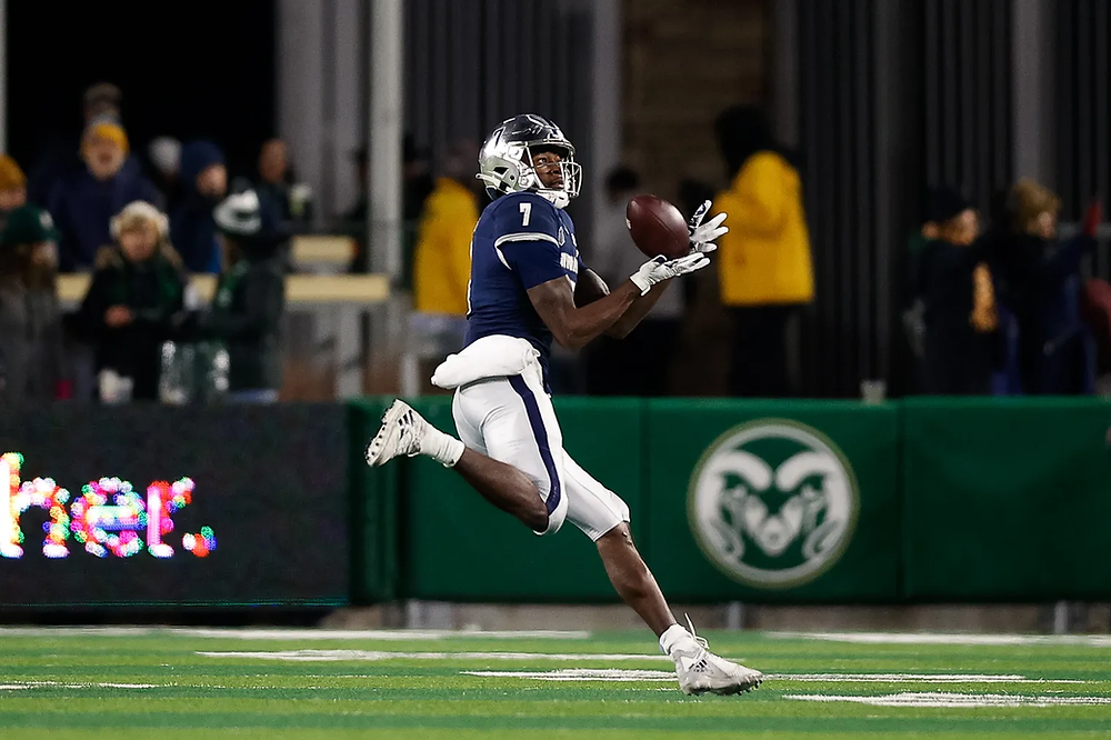 Romeo Doubs catching a pass.