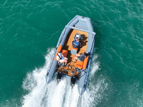 People enjoying a ride on a Takacat boat, experiencing fun and adventure with Takacat boats designed for water enthusiasts.