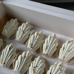 Elegant French Madeleines served at luxury brand event by Louis Vuitton