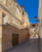 Smal, bratt gate i Castell de Castells i Spania