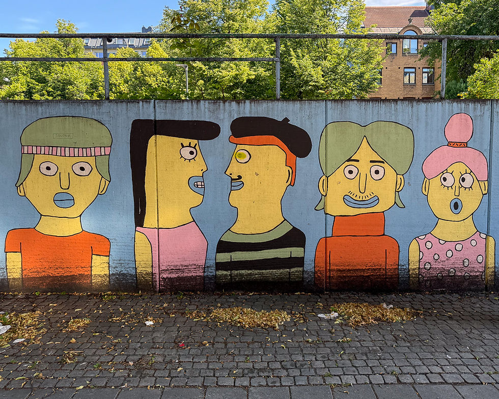 Mur med bilde av mennesker som kommuniserer gatekunst i Oslo