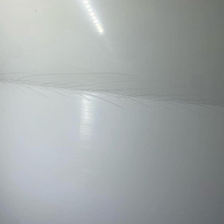 Cosmetic fiberglass gelcoat cracking with fine hairline cracks on boat hull