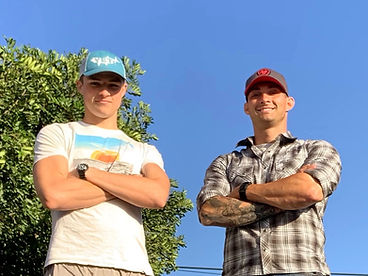 Brock and Bailey Bowers, founders of Bowers Drones, standing together in Arkansas.