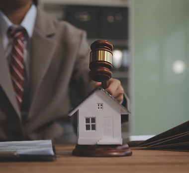 Real Estate Law, Home Insurance, property Tax, Auction and Bidding concepts. small toy hou