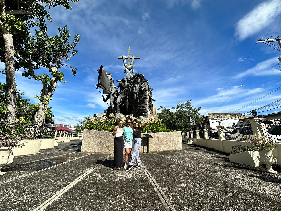 Posing infront of the Heritage of Cebu Monument
