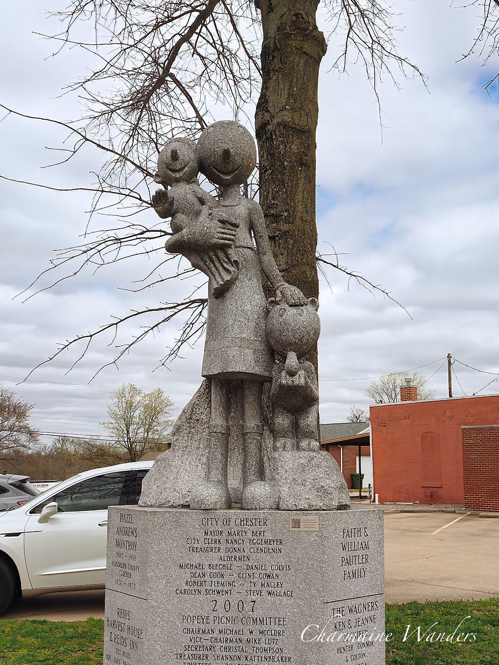 Olive Oyl, Swee’Pea, and Jeep (Eugene the Jeep) statues