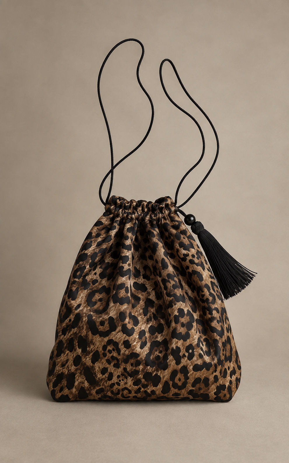 Leo Silk Pouch with gemstone and tassel