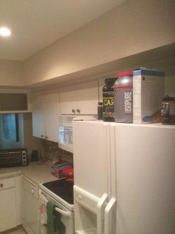 Stove/cabinets before