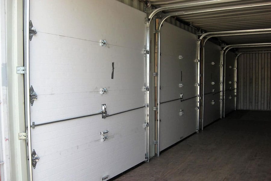 INSULATED GARAGE DOORS — Modified Containers available from Container Distribution