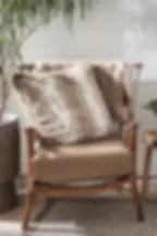Lynx Pattern Faux Fur Cushion On A Chair