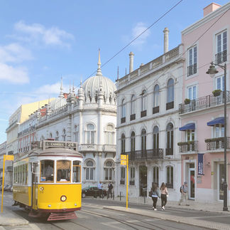 The streets of Portugal with a yellow street car