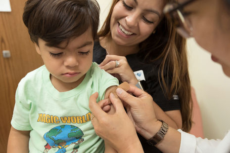 Child receiving medical treatment