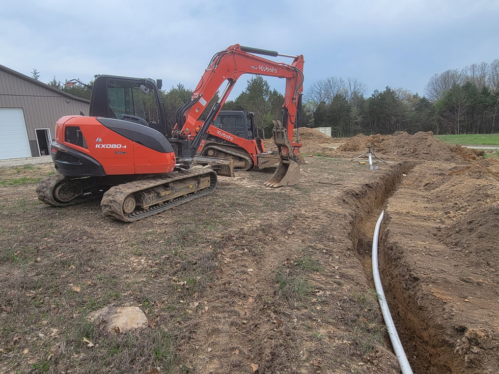 Two excavators on a construction site.