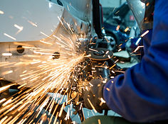 Craftsman repairman working with grinder