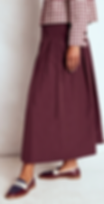 Woman wearing a skirt.