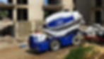 self loading concrete mixer working on site