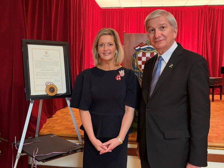 EUGENE CZOLIJ GREETED THE HONORARY CONSUL OF CROATIA