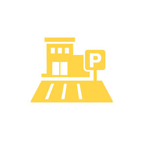 Commercial building with parking lot and painted lines, representing professional parking lot striping services.