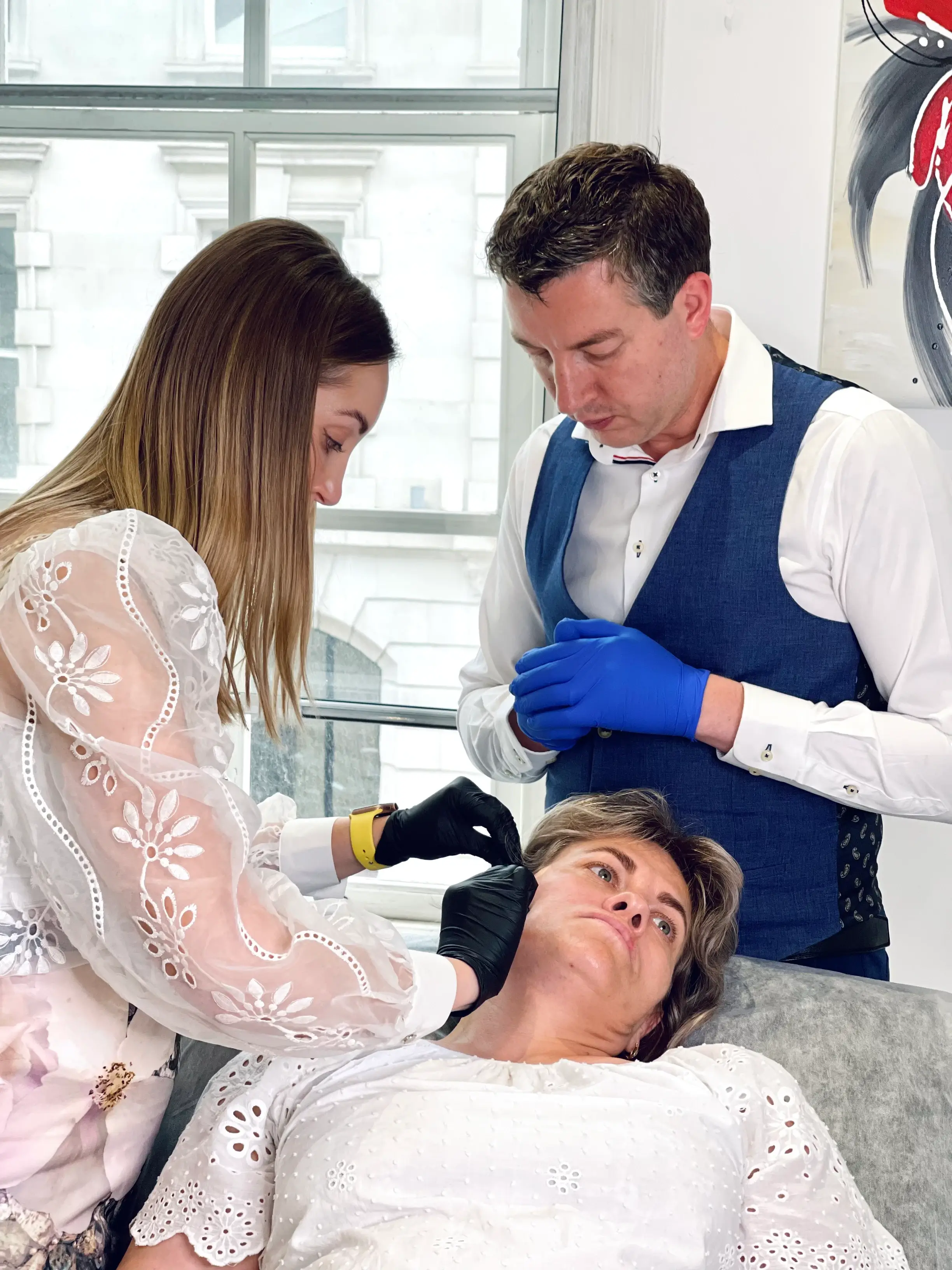 aesthetic practitioner performs the pdo face thread lift treatment under the doctor supervision