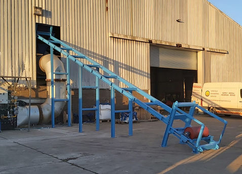 Aggregate processing system being installed outside facility building