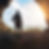 Man walking out of a dark tunnel looking into the sun