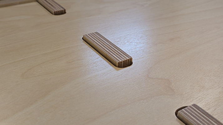 Fine detail of the bespoke residential fit-out solution showcasing sustainable birch plywood finishes by Studio Roundhouse.