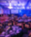 gasty event, black and gold event, charity event, gold palm centrepieces, feather centrepieces