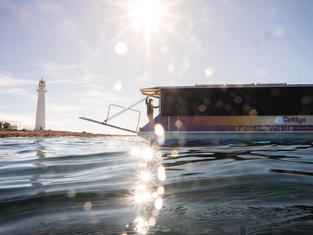 Enjoy dry feet on Cuttys glass bottom boat