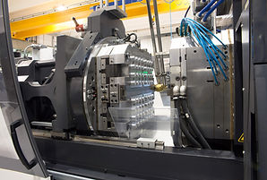 Injection molding machines in a large factory. Department of Italian industry specialized