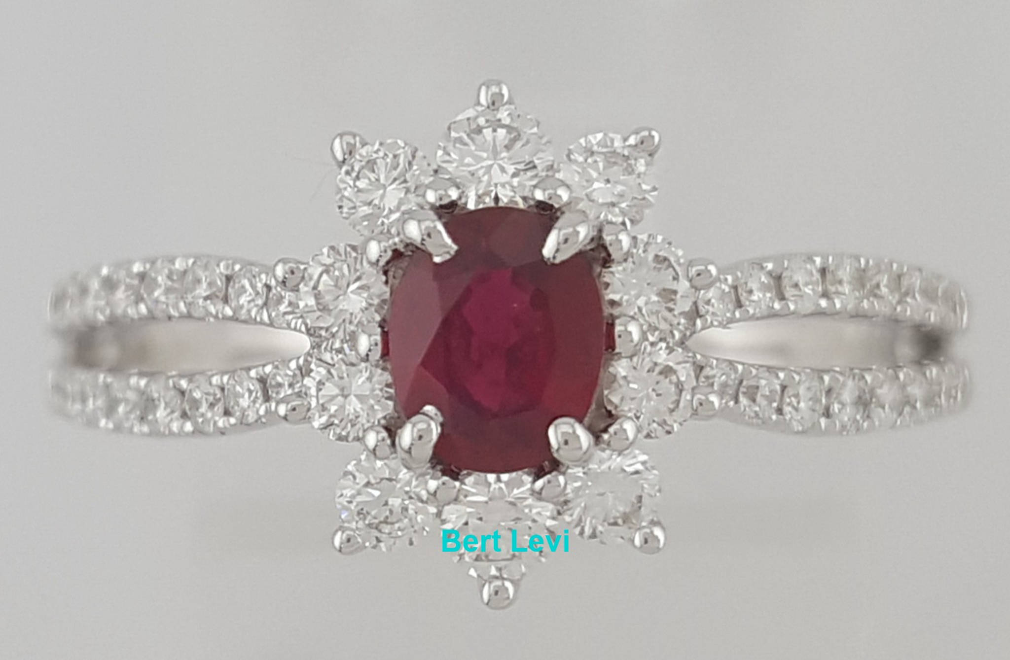 Oval Ruby Round Diamond Halo Split Shank Ring 1 ct 18k White Gold