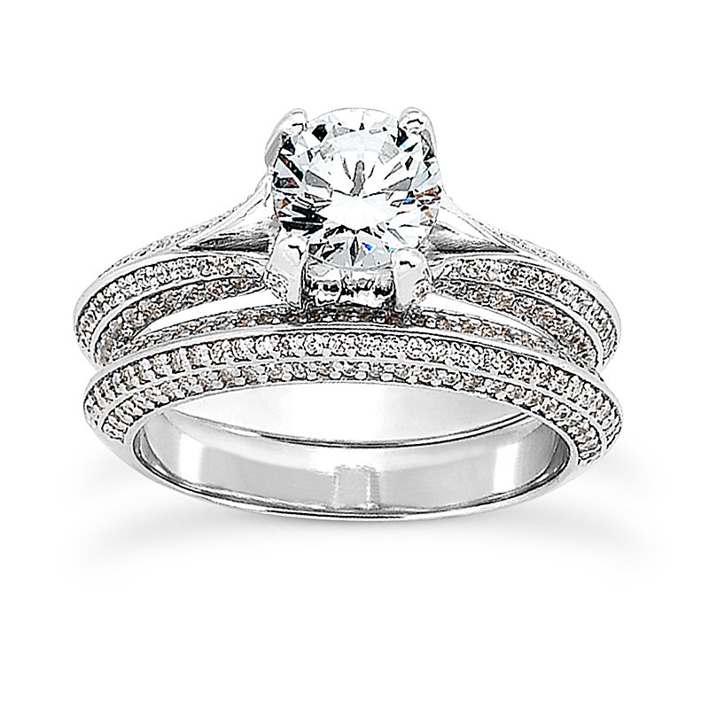 Image of an engagement ring and weddihng band with diamonds in San Diego
