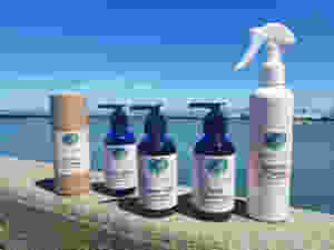 Natural skincare products on ledge by San Francisco Bay