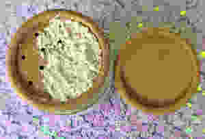 View of powder-based skincare cleanser from top with lid off