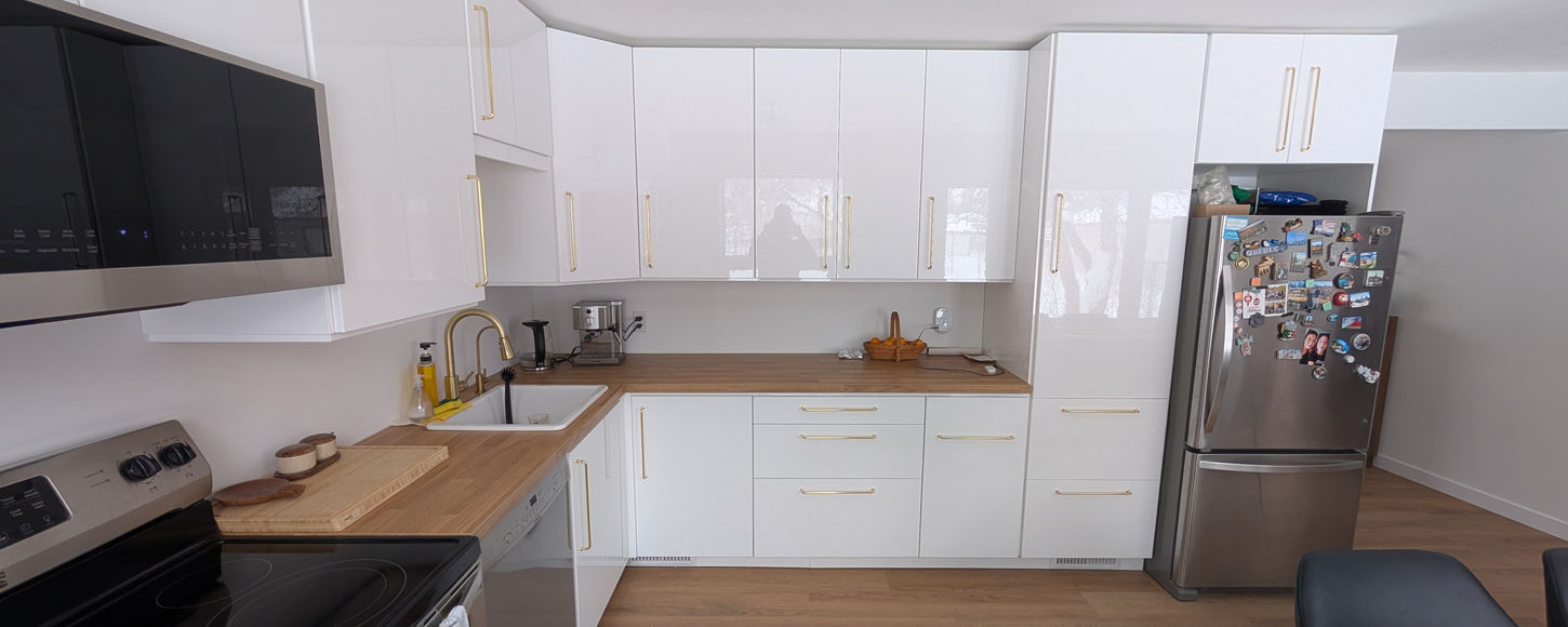 Kitchen flooring installation in Regina by B-Flex Services with updated floor and finished interior.
