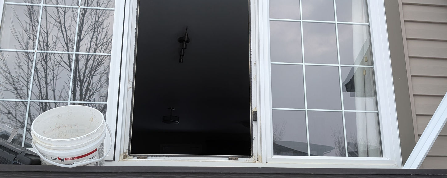 Before interior photo of a window glass replacement project in Regina, Saskatchewan by B-Flex Services.