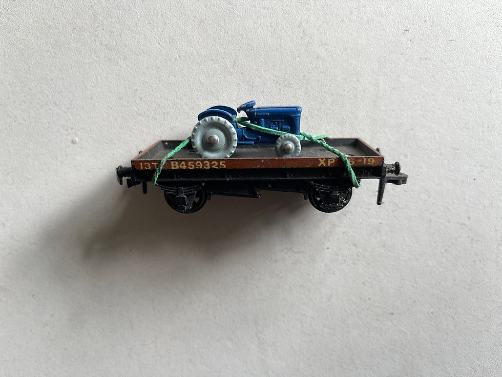 A rare boxed Hornby-Dublo No.4649 Low-sided Wagon with Tractor. Wagon A rare boxed Hornby-Dublo No.4649 Low-sided Wagon with Tractor. Wagon