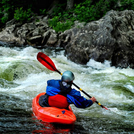 Kayaker approaching Rapids