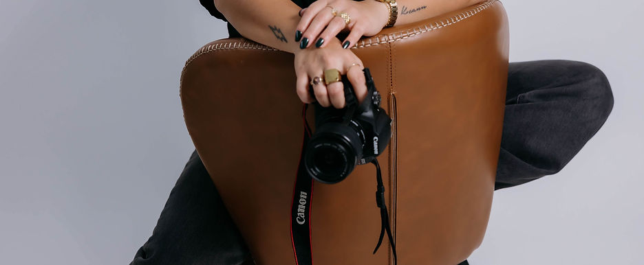 holding canon camera
