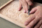 Carving wood in the traditional Ainu method