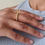 Thumbnail: Bubble ring worn on middle finger of model