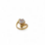 gold ring with large CZ stone on white background