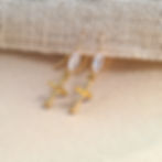 Gold cross drop earrings with zirconia marquise stone