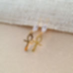 Gold ankh cross drop earrings with zirconia marquise stone