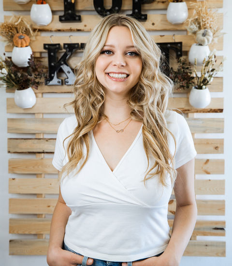 A chic beach wave hairstyle with loose, natural-looking waves, evoking a sense of effortless style and a carefree coastal vibe