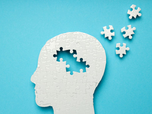 Illustration showing a human head shaped puzzle with pieces floating off to the right
