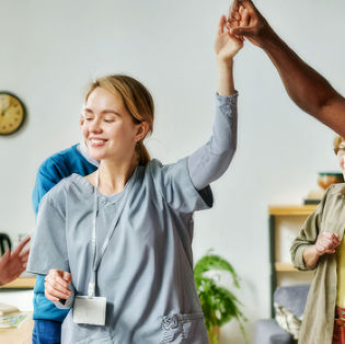 Physical therapist working with dementia patients
