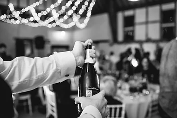 Celebrating with champagne at the wedding breakfast