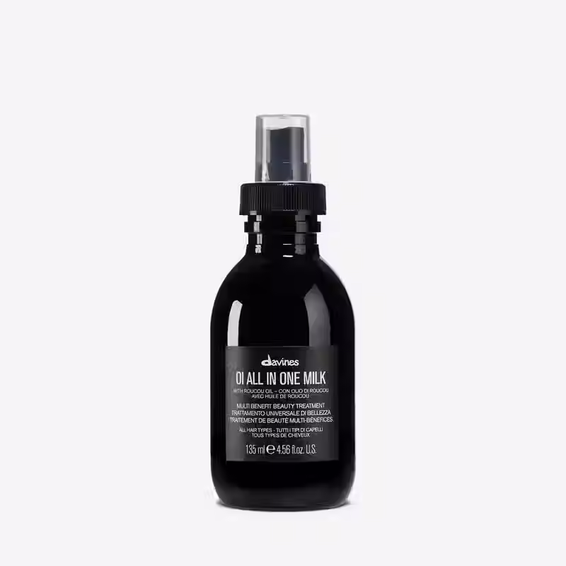 Davines OI All In One Milk 135ml leave in spray bottle on light background
