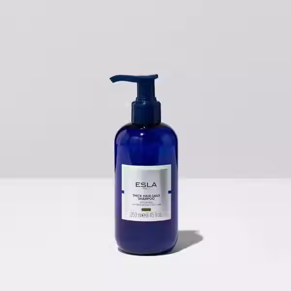 ESLA Thick Hair Daily Shampoo 250ml blue pump bottle on clean white background