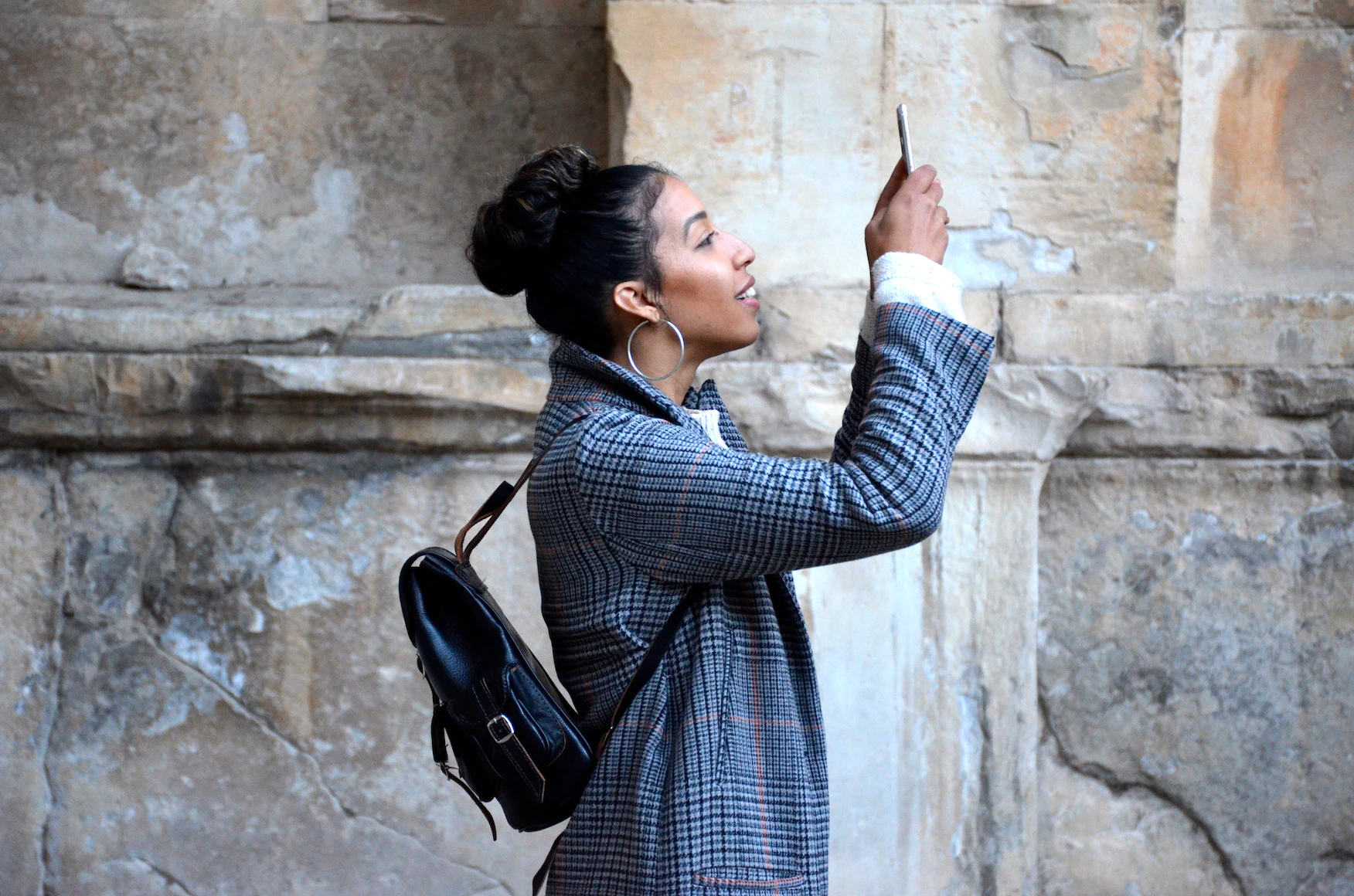 A girl filming engaging content for social media